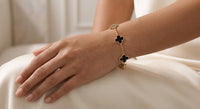 18k Gold 5 Motif Clover Bracelet in Deep Black Onyx & Gold vermeil with original packaging