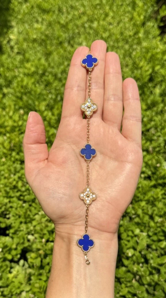 18k gold Vintage VCA Vintage Alhambra Bracelet three deep blue lapis lazuli motifs, accented by two diamond-set